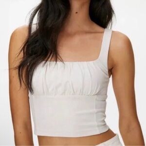 “TWO” Wilfred Free Crop Tanks. Both Sz~M 1~Black and 1~White